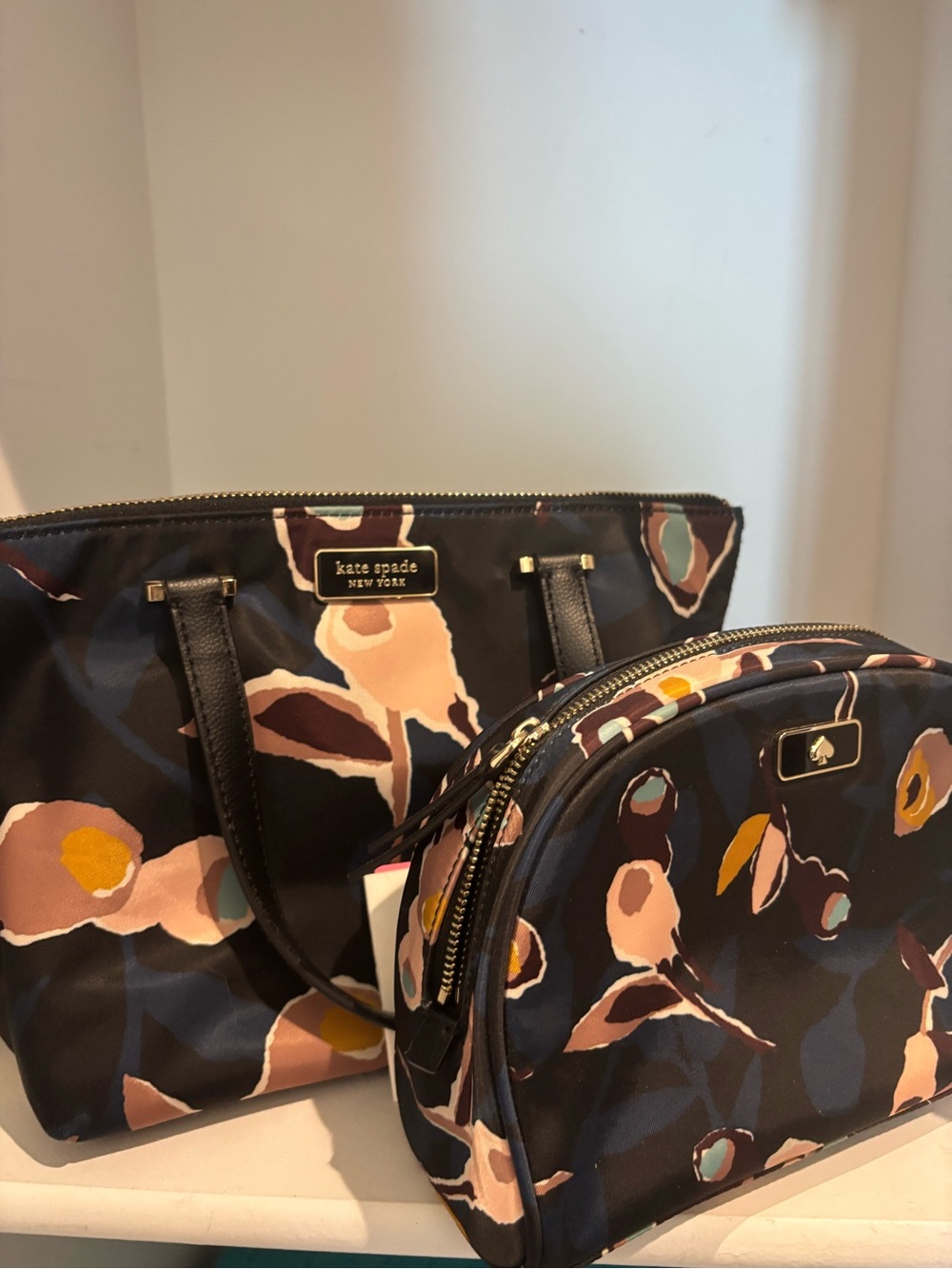 kate spade navy floral tote and matching cosmetic pouch
